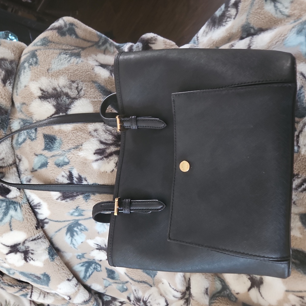 Michael Kors black medium-size bucket pocketbook.  Multiple pockets for storage.